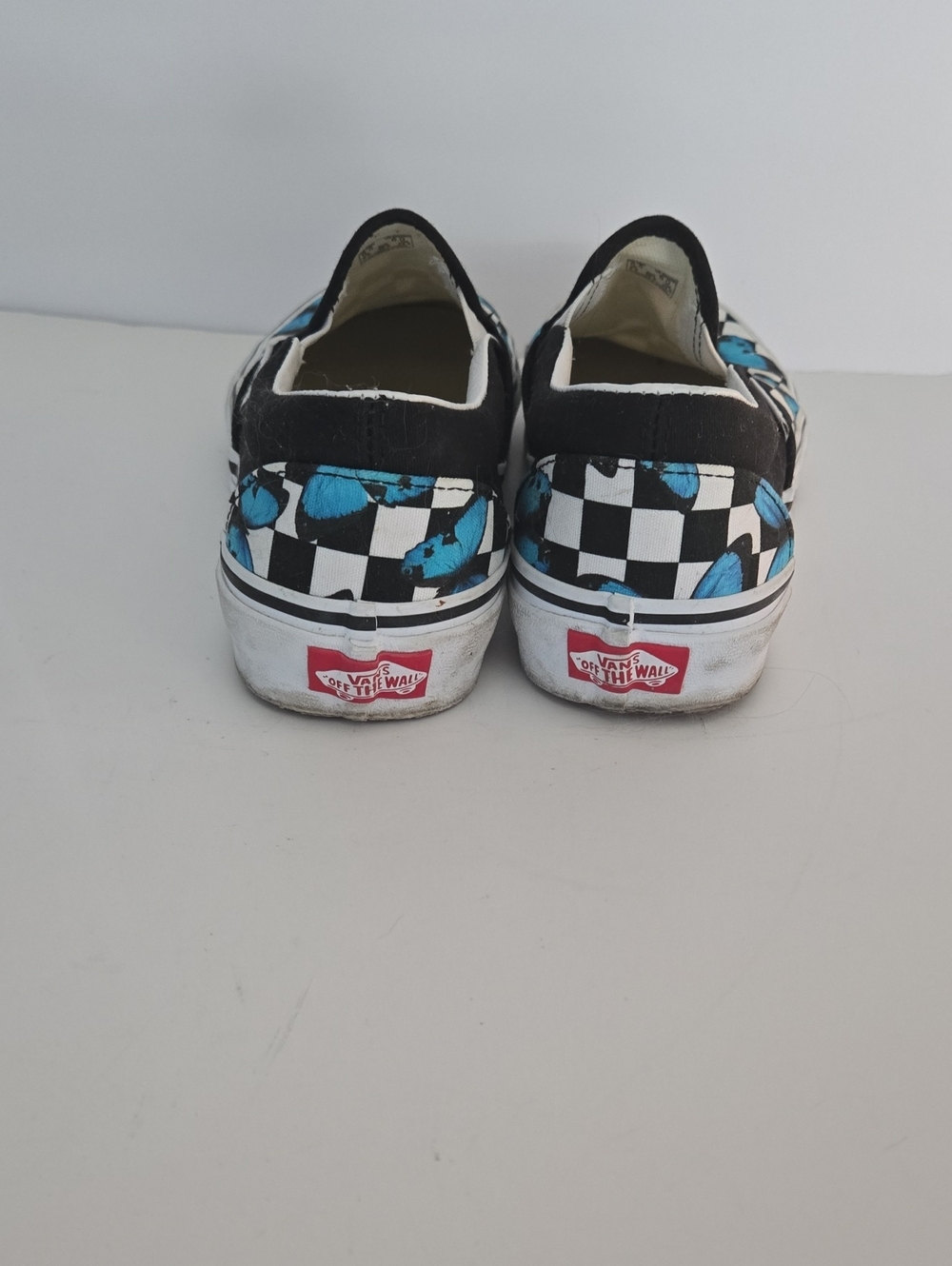 Vans Black & White Checkerboard Slip-Ons with Blue Butterfly Print - Picture 3 of 6